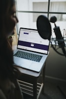 macbook pro on white table