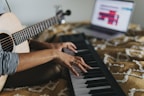person playing black and white piano