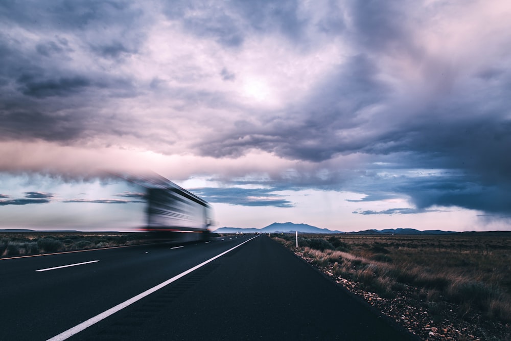 time lapse photography of cars on road during night time