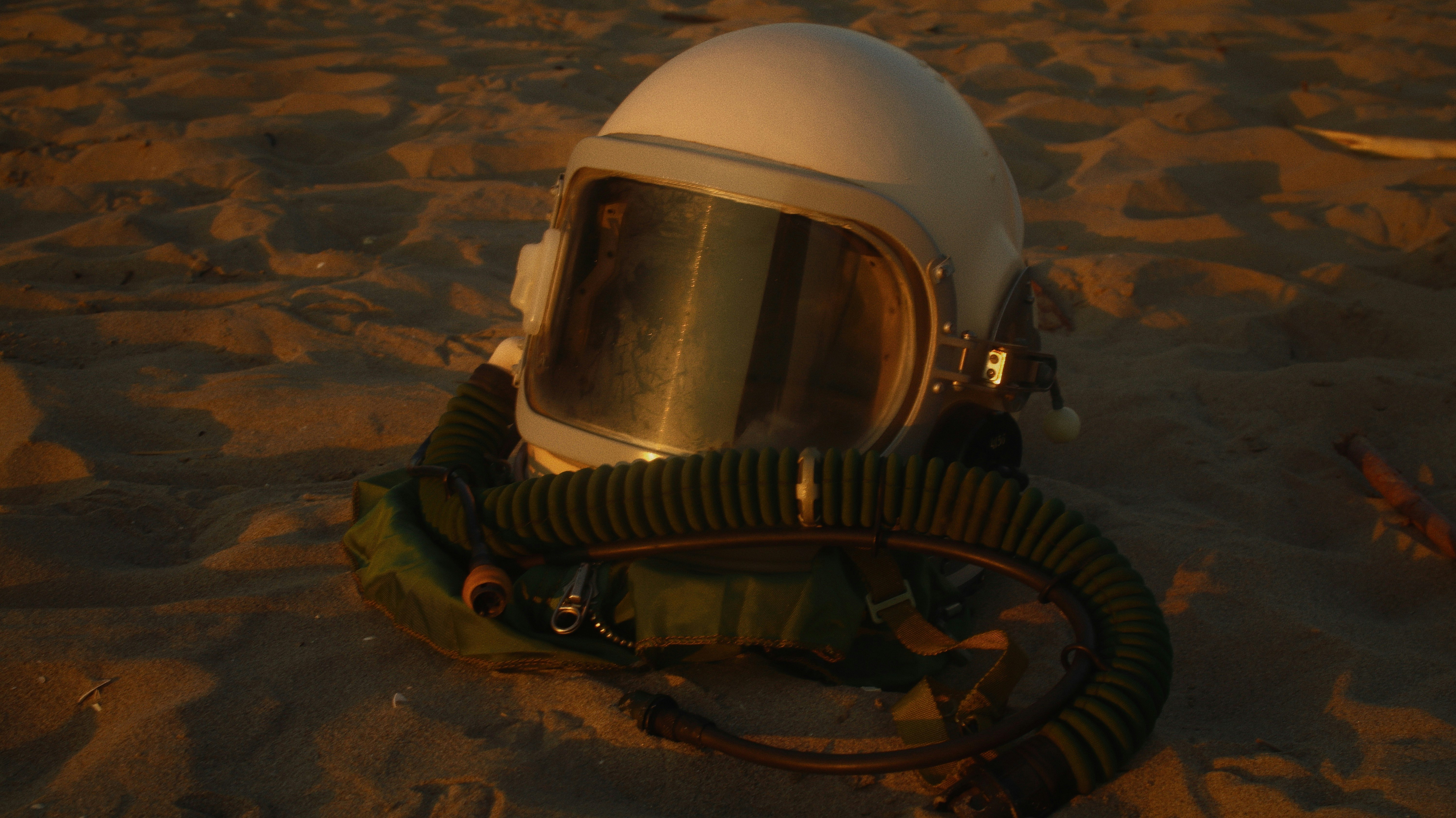 white helmet on brown sand
