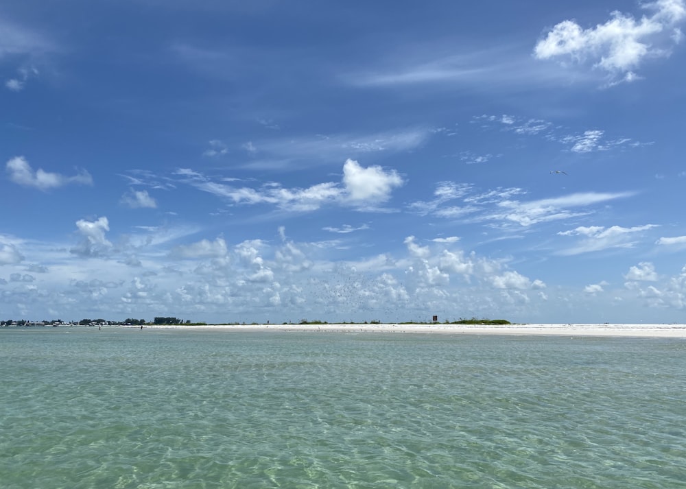 blue sky and white clouds over sea