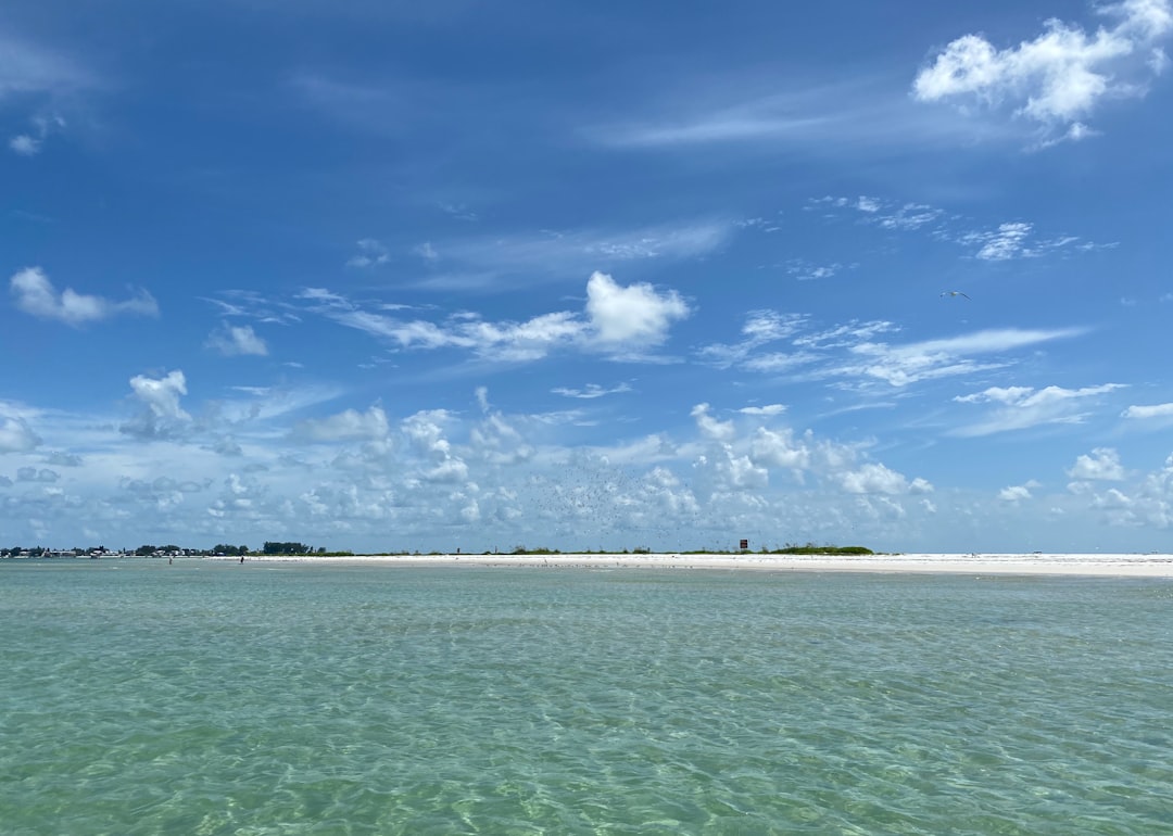 blue sky and white clouds over sea