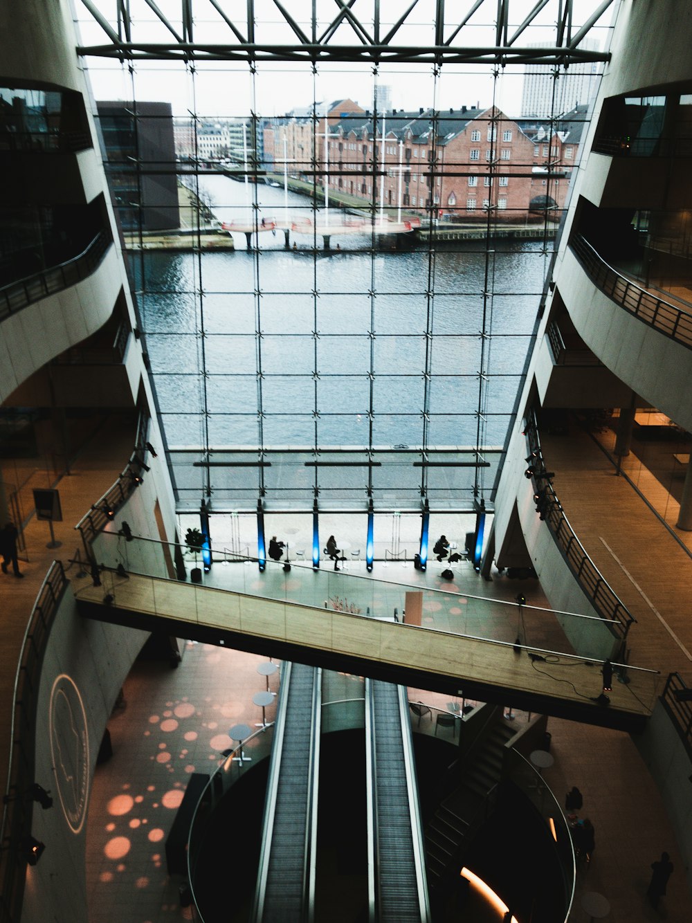 people walking on hallway inside building