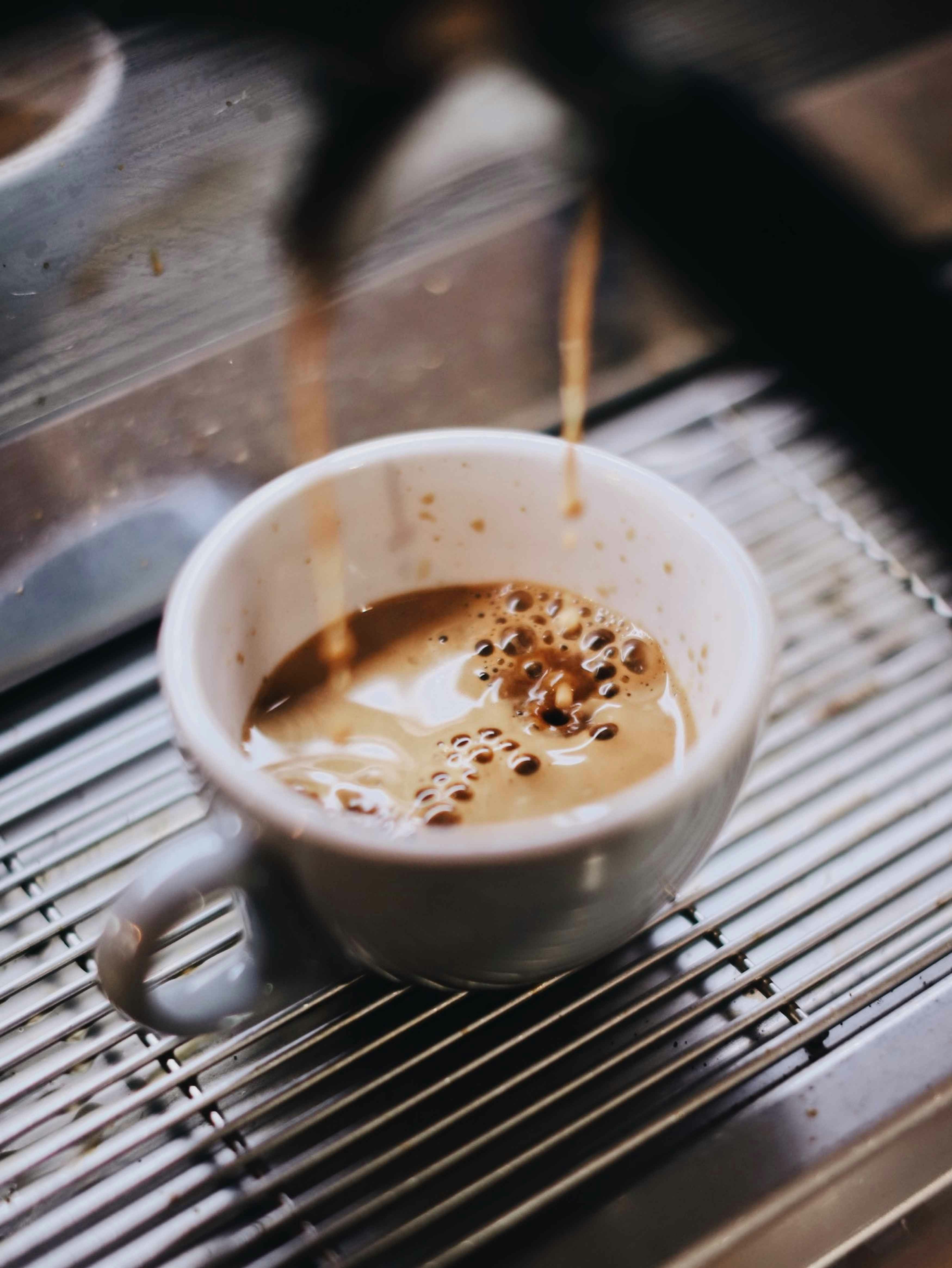 white ceramic mug with coffee