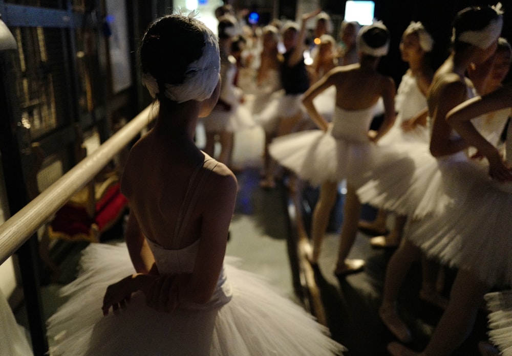 woman in white dress walking on street