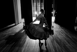 woman in white dress playing violin