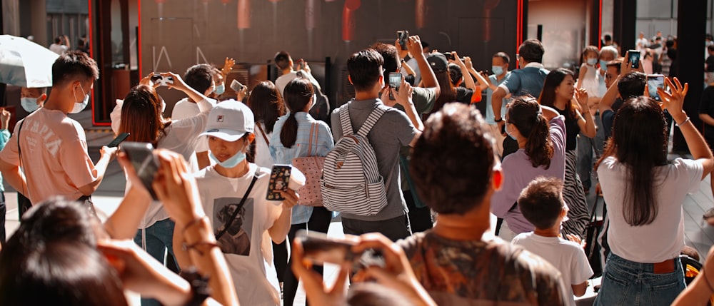 people gathering on concert during daytime