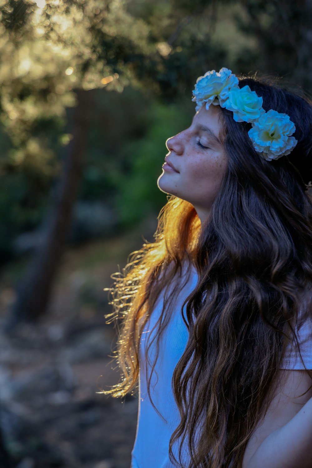 woman in blue flower crown