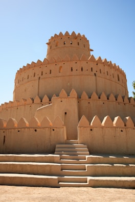 A fortified shelter with sandbags and wooden barriers protecting the entrance.