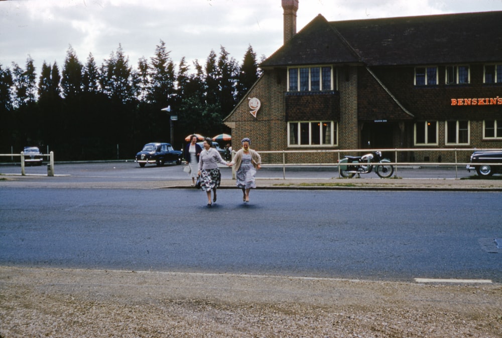 2 men riding on white horse on road during daytime