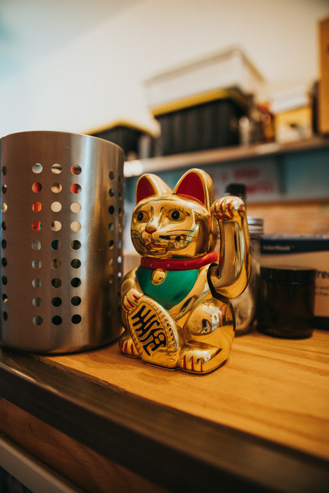 gold and blue ceramic owl figurine