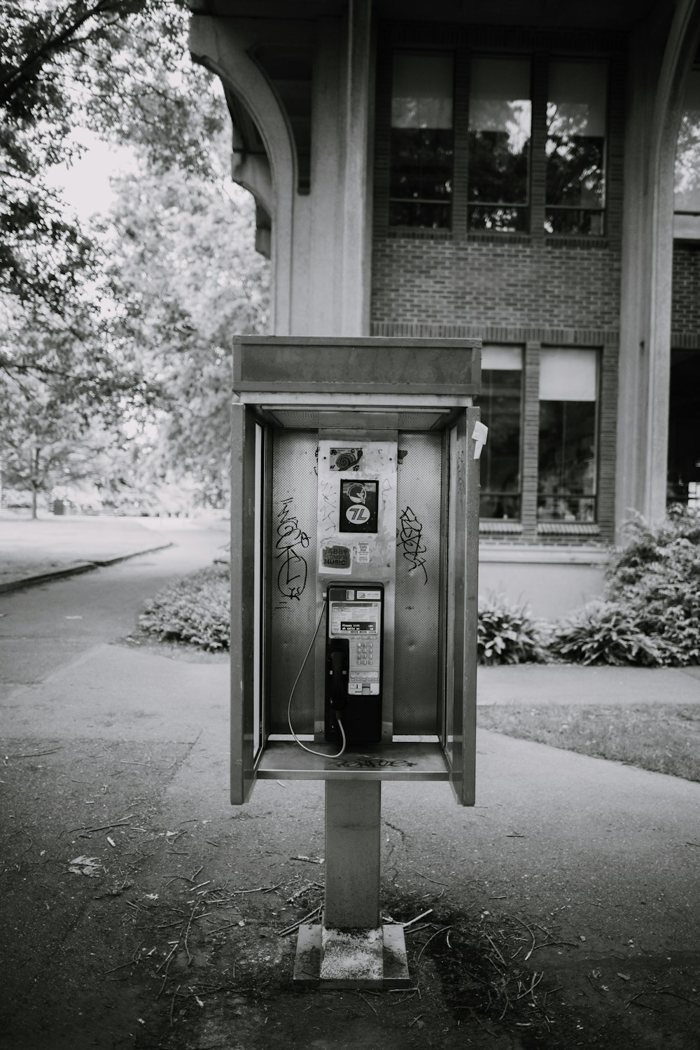 black and gray telephone booth