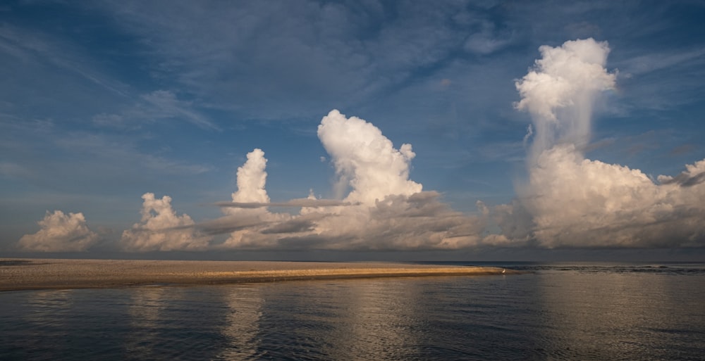 blue sky and white clouds over the sea