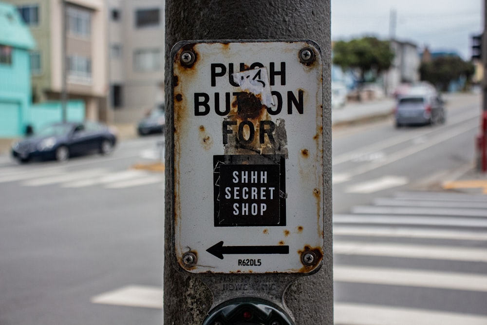 white and black street sign