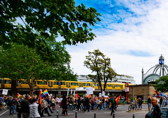 people walking on street near green trees during daytime in Nollendorfplatz Germany