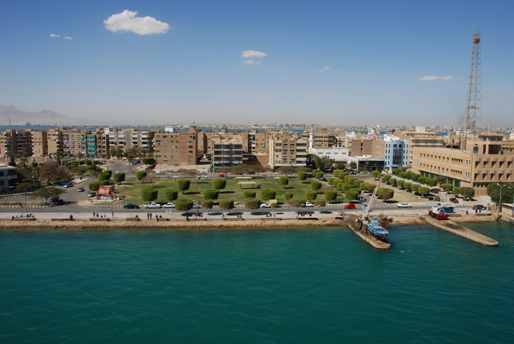 Bahrain skyline with IT professionals and pharmaceutical research facilities