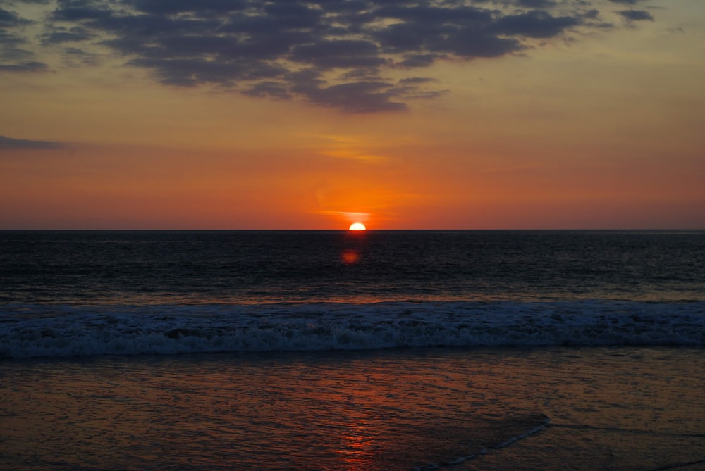 body of water during sunset photo – Free Nature Image on Unsplash