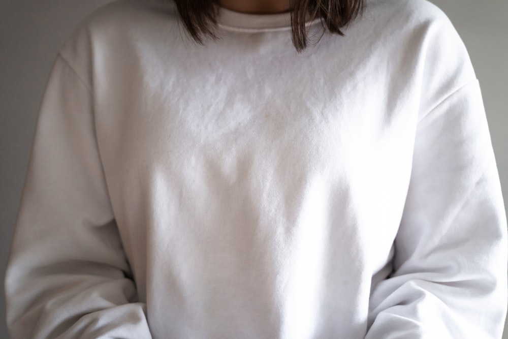 woman in white crew neck shirt