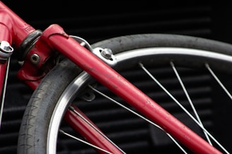 Close-up of a stylish used bicycle with minor wear, ready for a new owner.