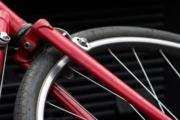 Close-up of a stylish used bicycle with minor wear, ready for a new owner.