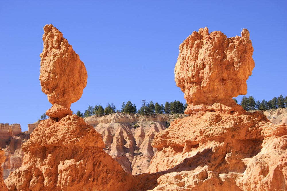 brown rocky mountain under blue sky during daytime