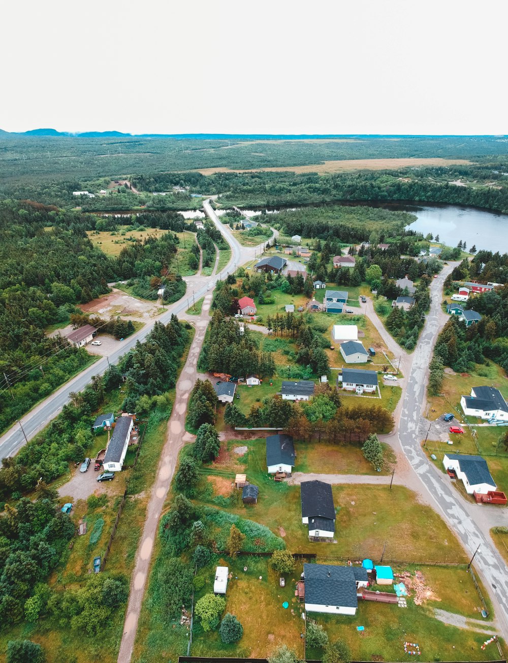 aerial view of city buildings and trees during daytime