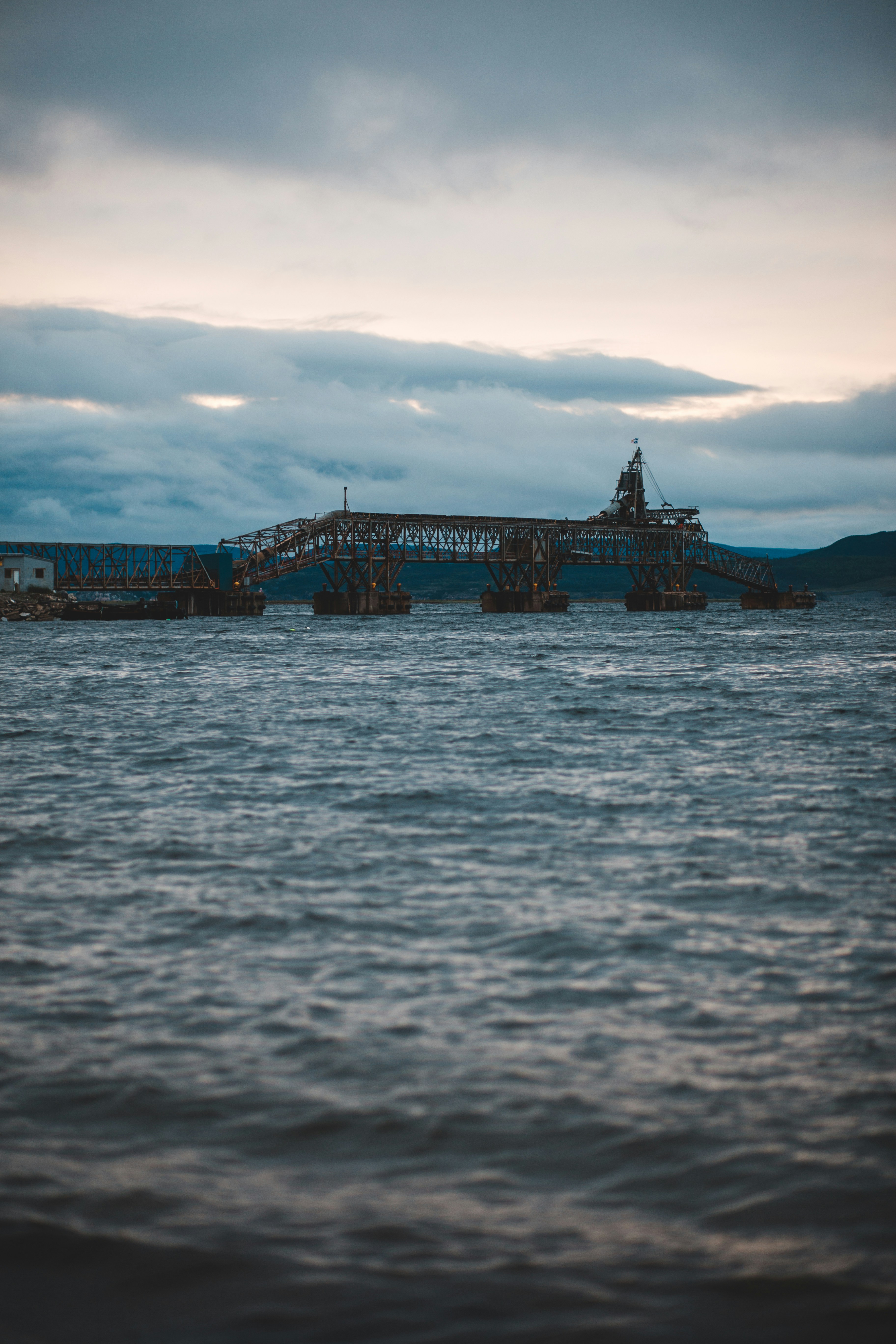 Brown wooden dock on sea under cloudy sky during daytime photo – Free ...