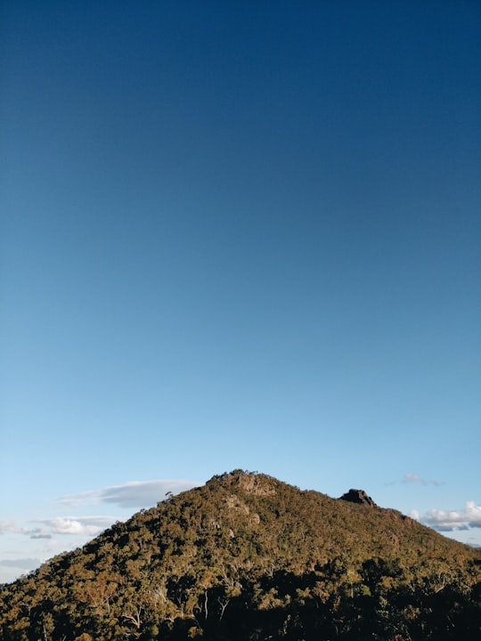 brown and green mountain under blue sky during daytime in Victoria Australia