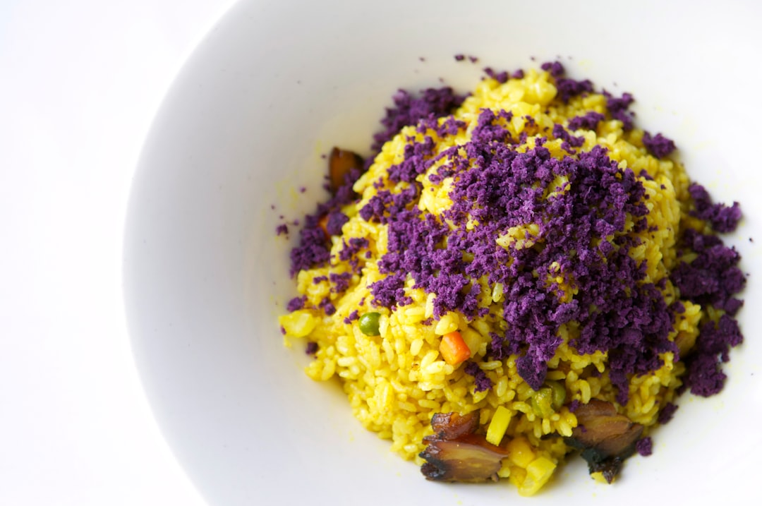 yellow rice on white ceramic bowl