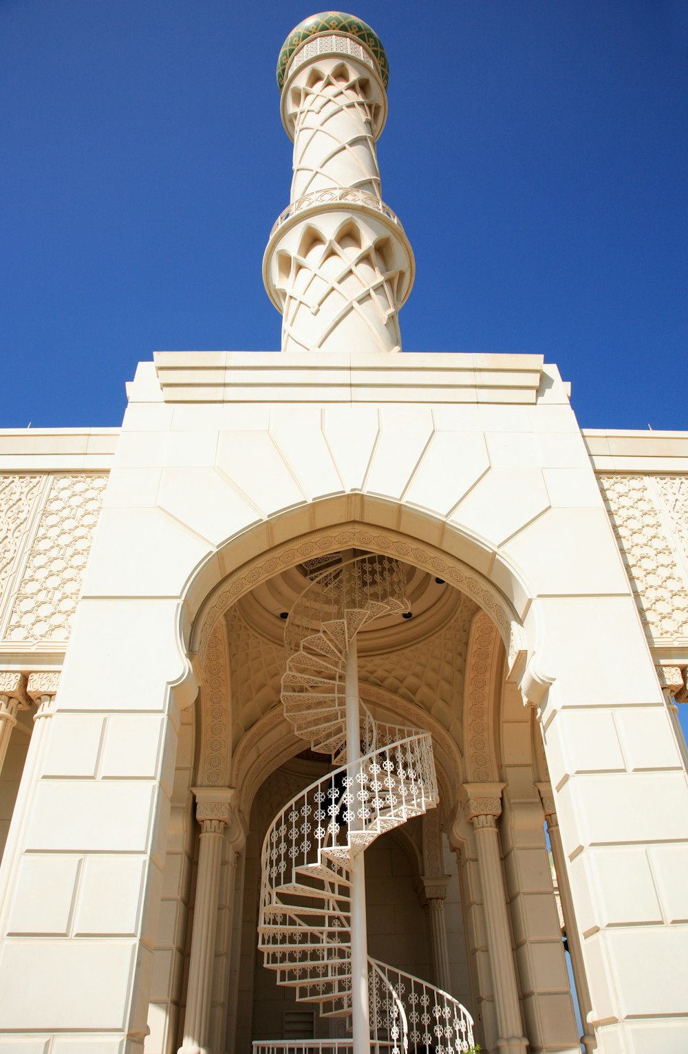 white concrete building under blue sky during daytime