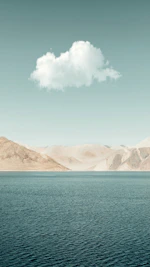 A serene desert landscape with a soft glowing cloud overhead symbolizing guidance and protection.