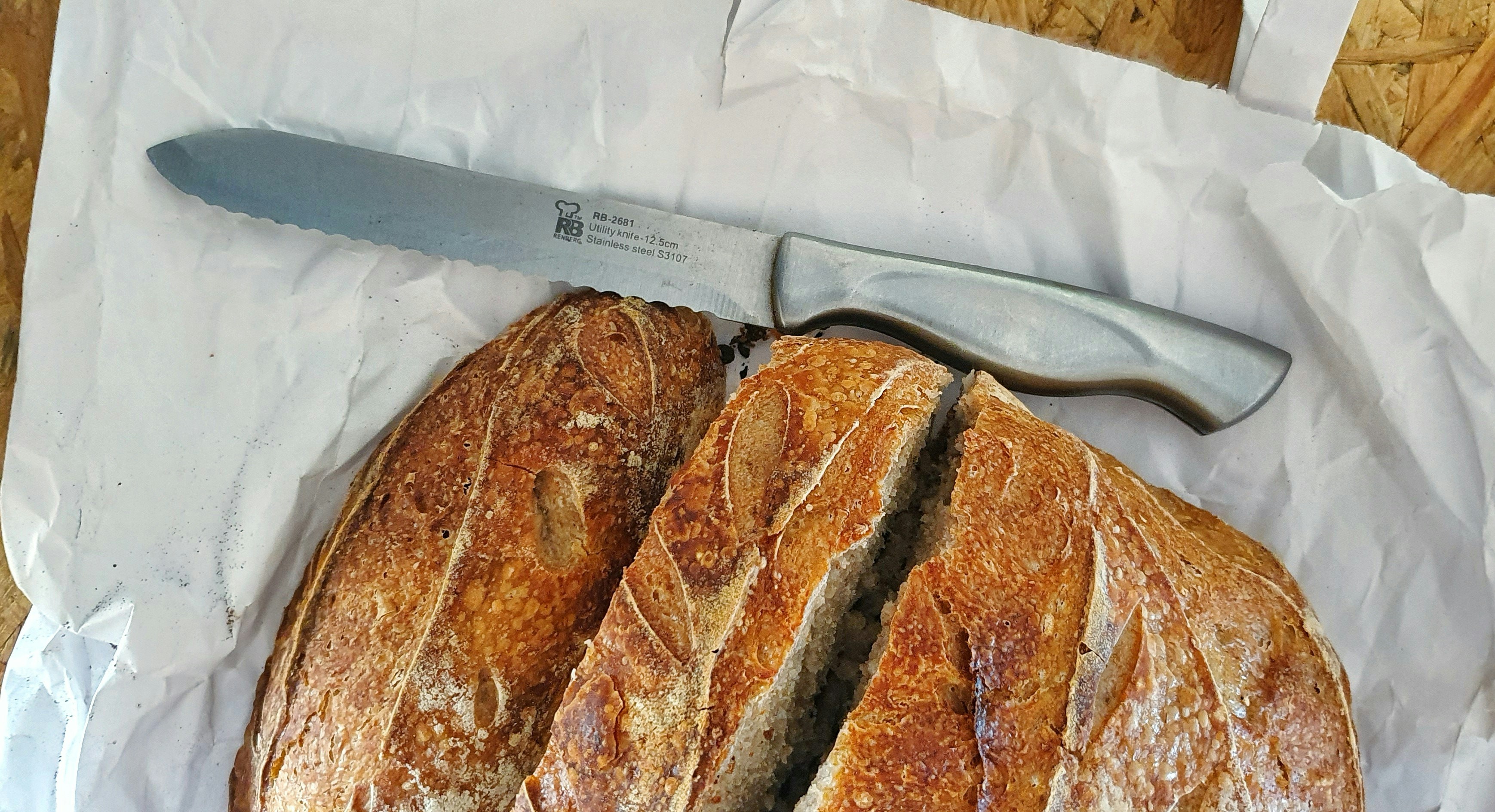 brown bread on white plastic pack benin teams background