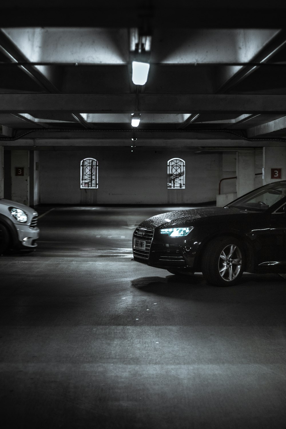 black bmw m 3 coupe parked in garage