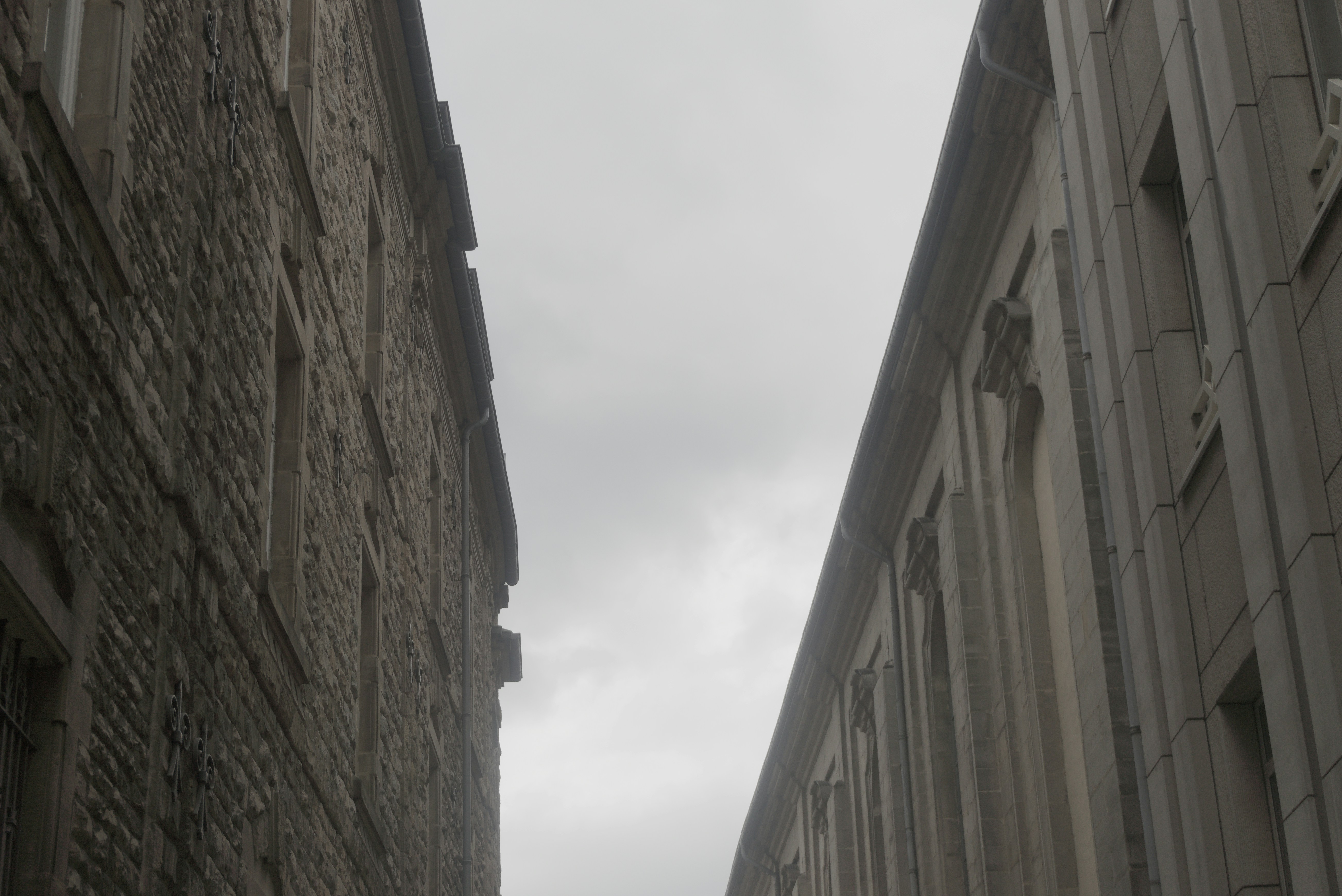 The grey between two old buildings