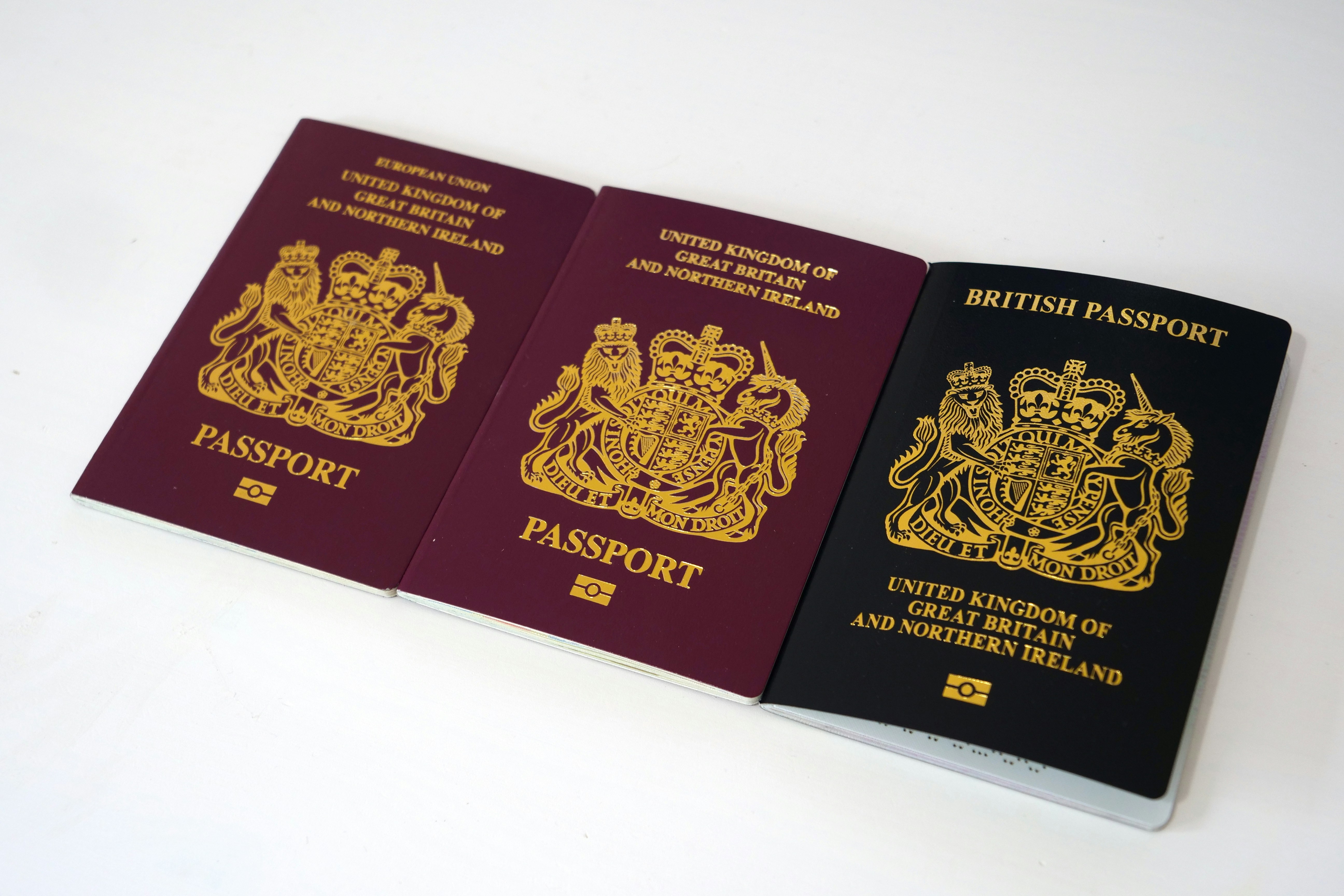 Old, transition and new UK passport