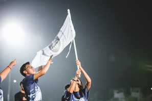 Flag Midia team celebrating a successful campaign launch