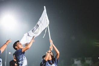 Flag Midia team celebrating a successful campaign launch