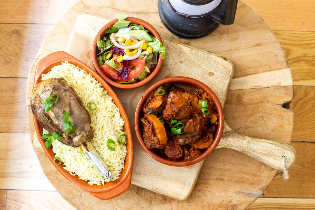 cooked food on red ceramic bowl