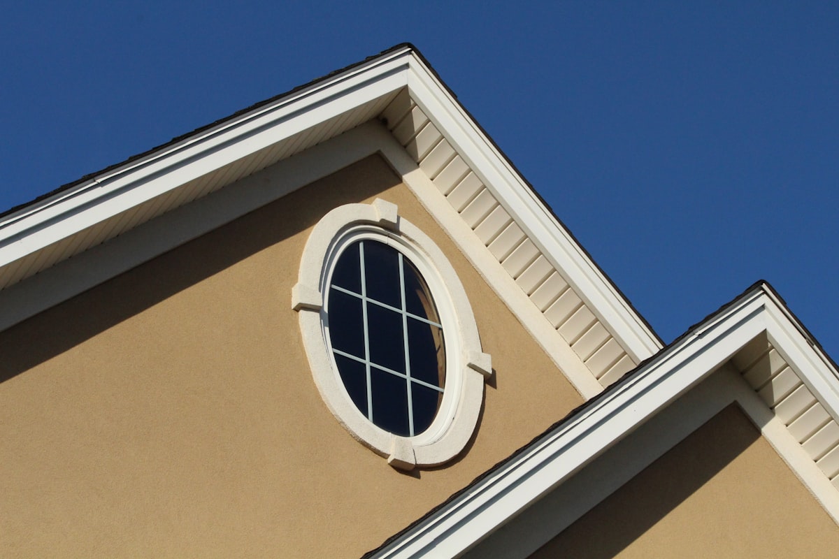 Beige stucco home gable