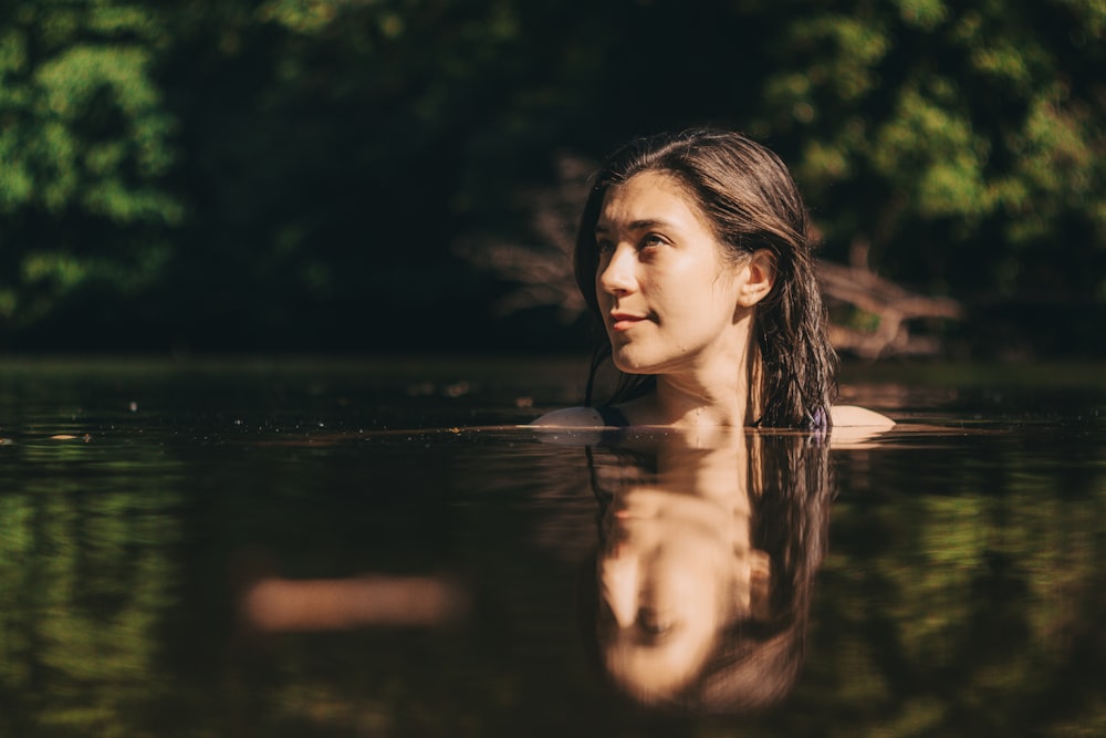 woman in water during daytime