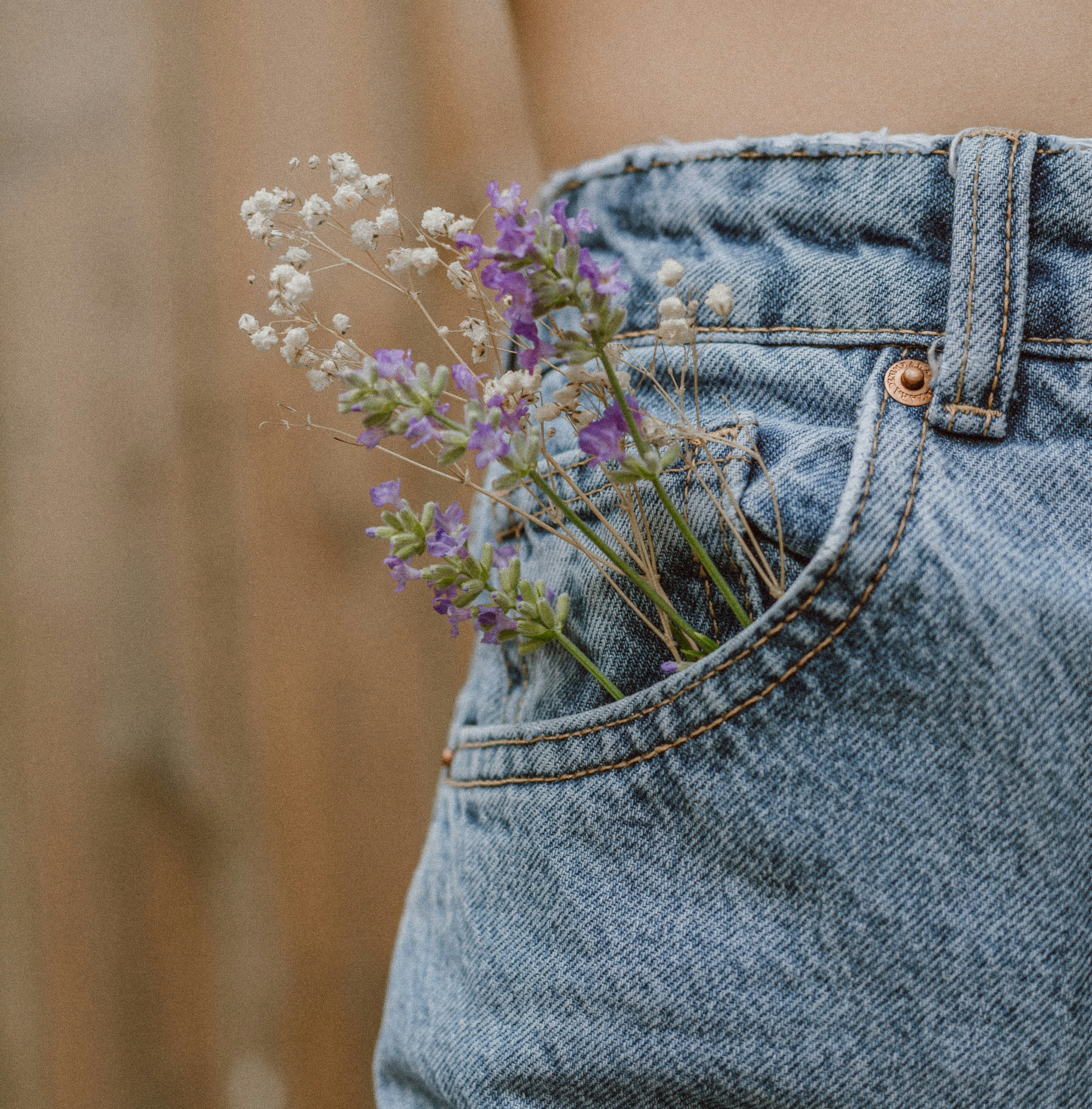 purple flower on blue denim shorts