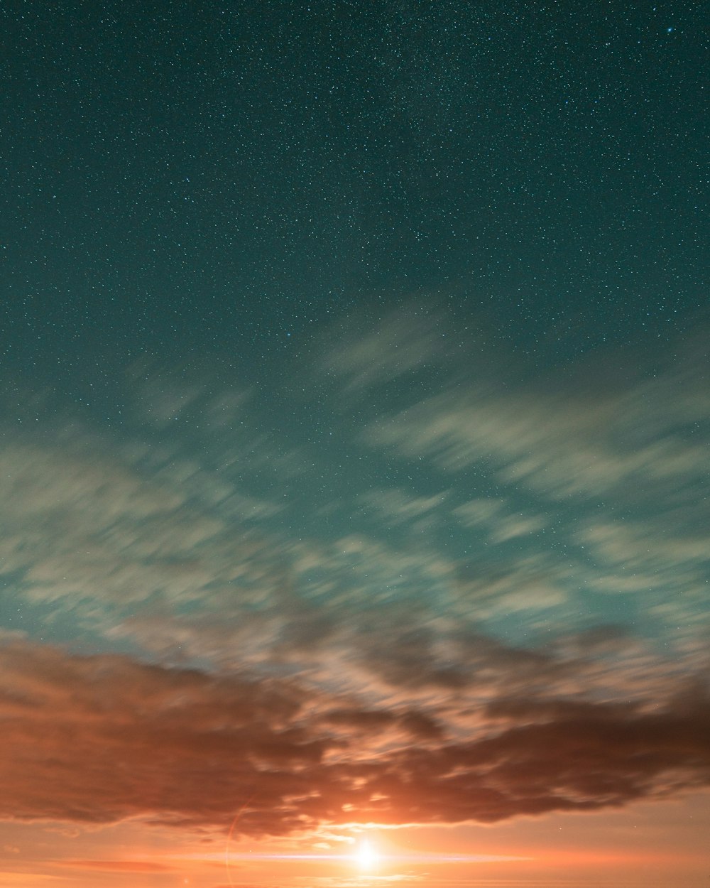 blue and orange sky during sunset