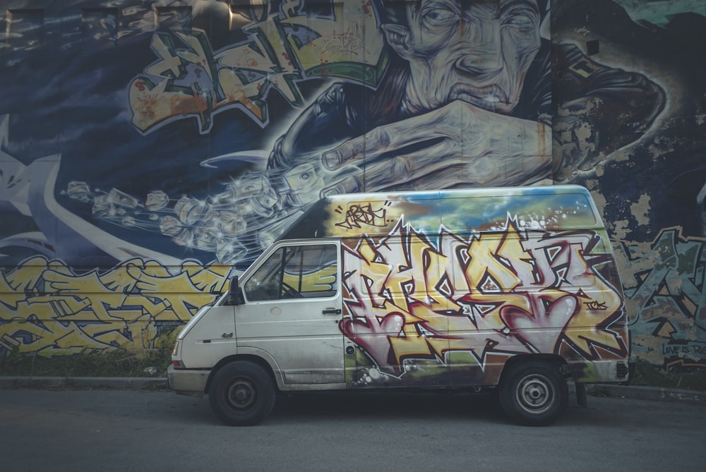 white yellow and blue van