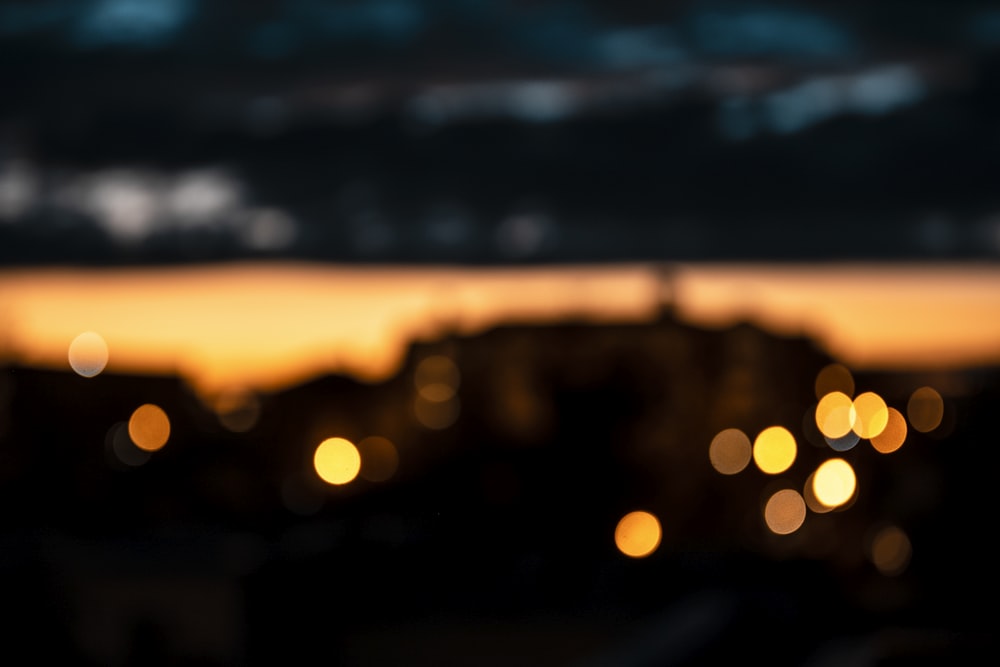 bokeh photography of city lights during night time