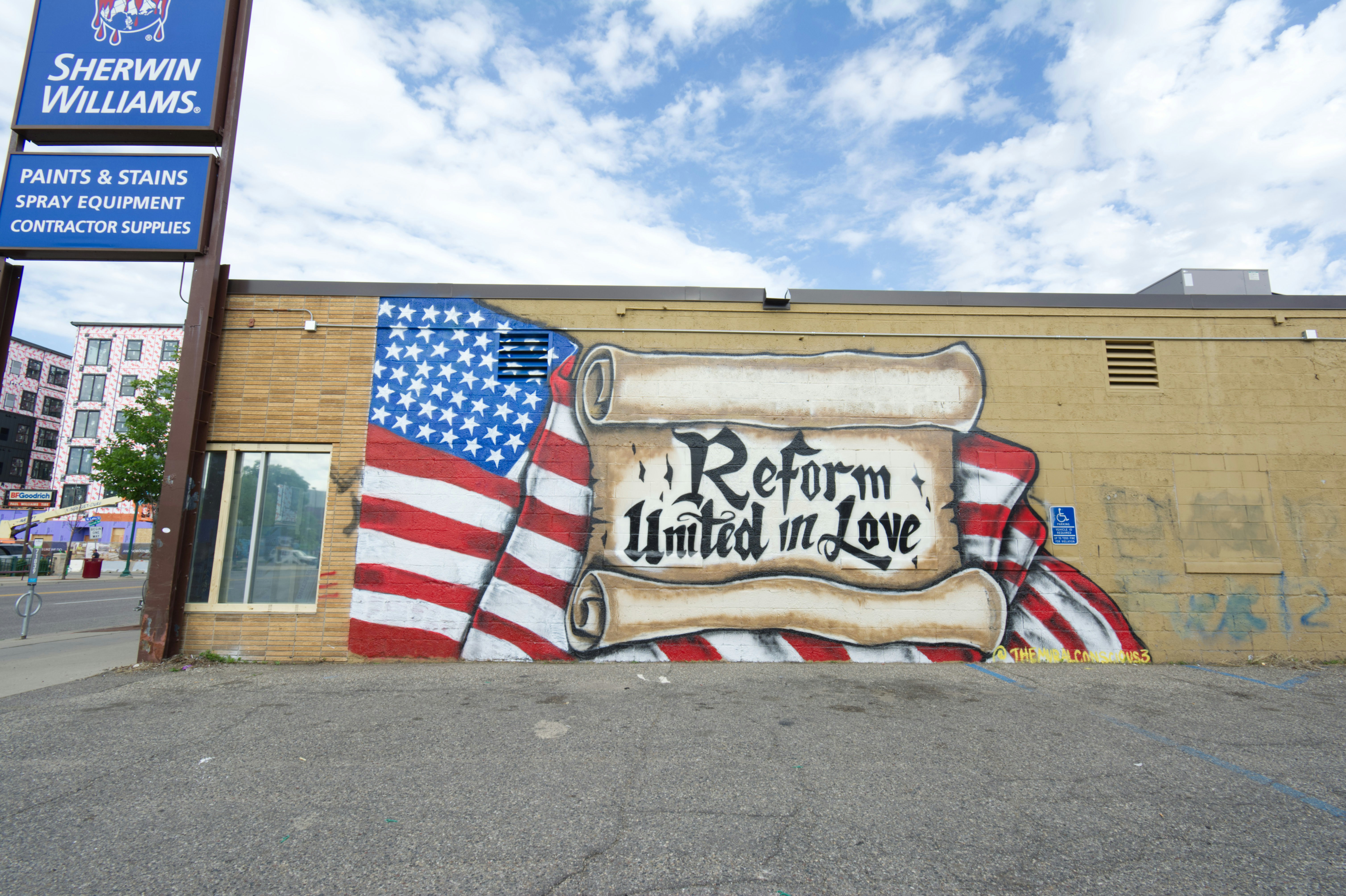 white and black welcome to the beach signage