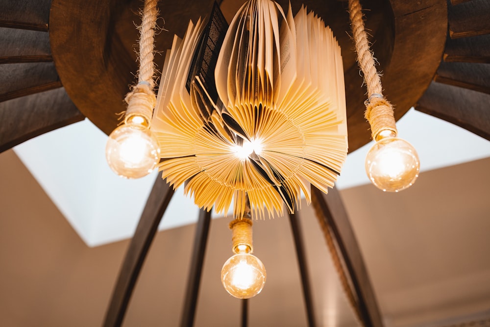 gold and white pendant lamp