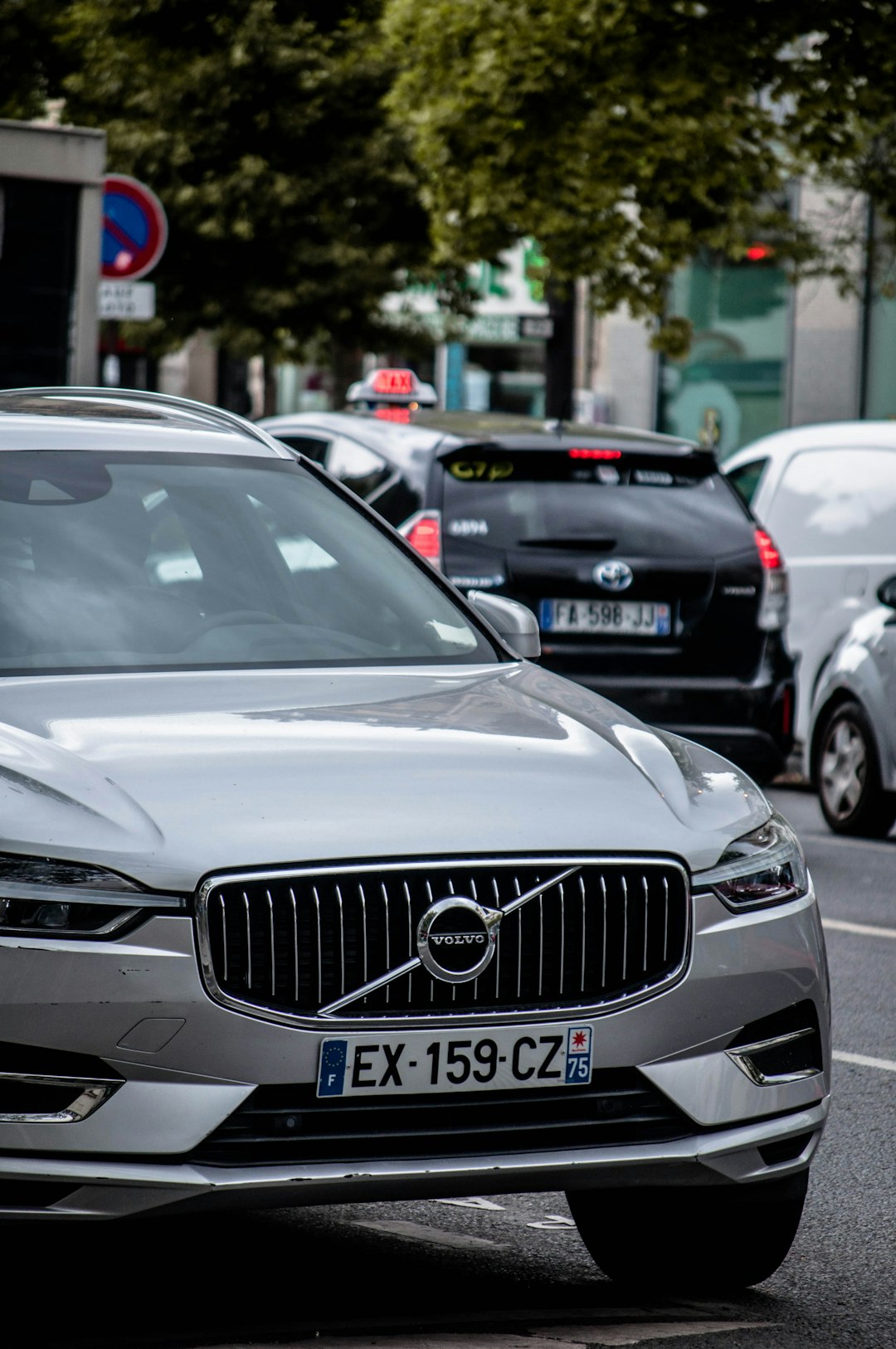 white audi car on road during daytime