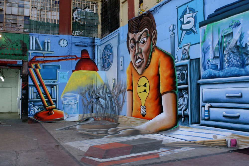 woman in yellow shirt standing beside wall with graffiti