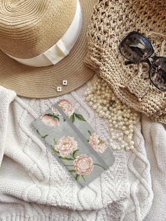 brown knit hat and black sunglasses