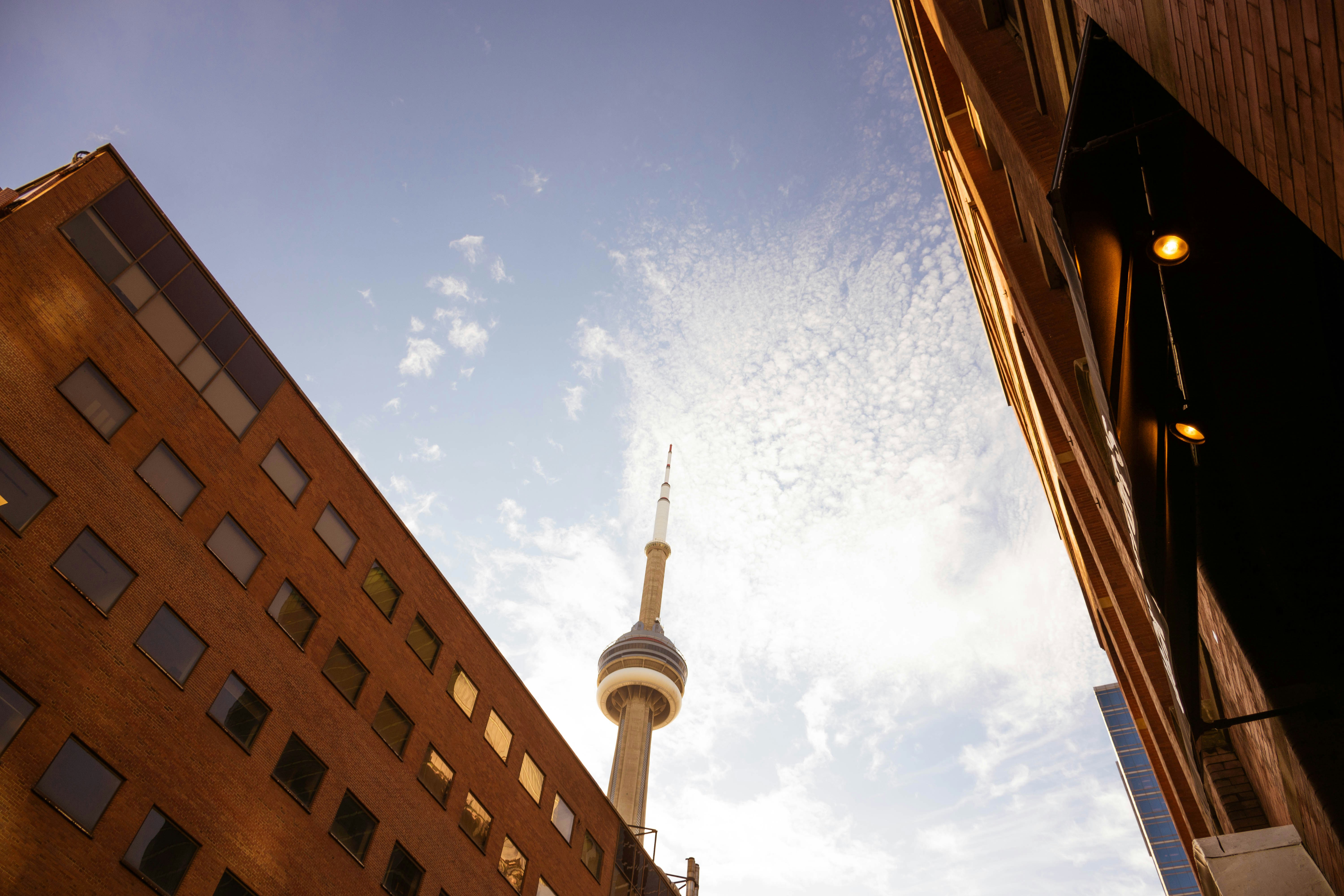 brown concrete building under blue sky during daytime, 